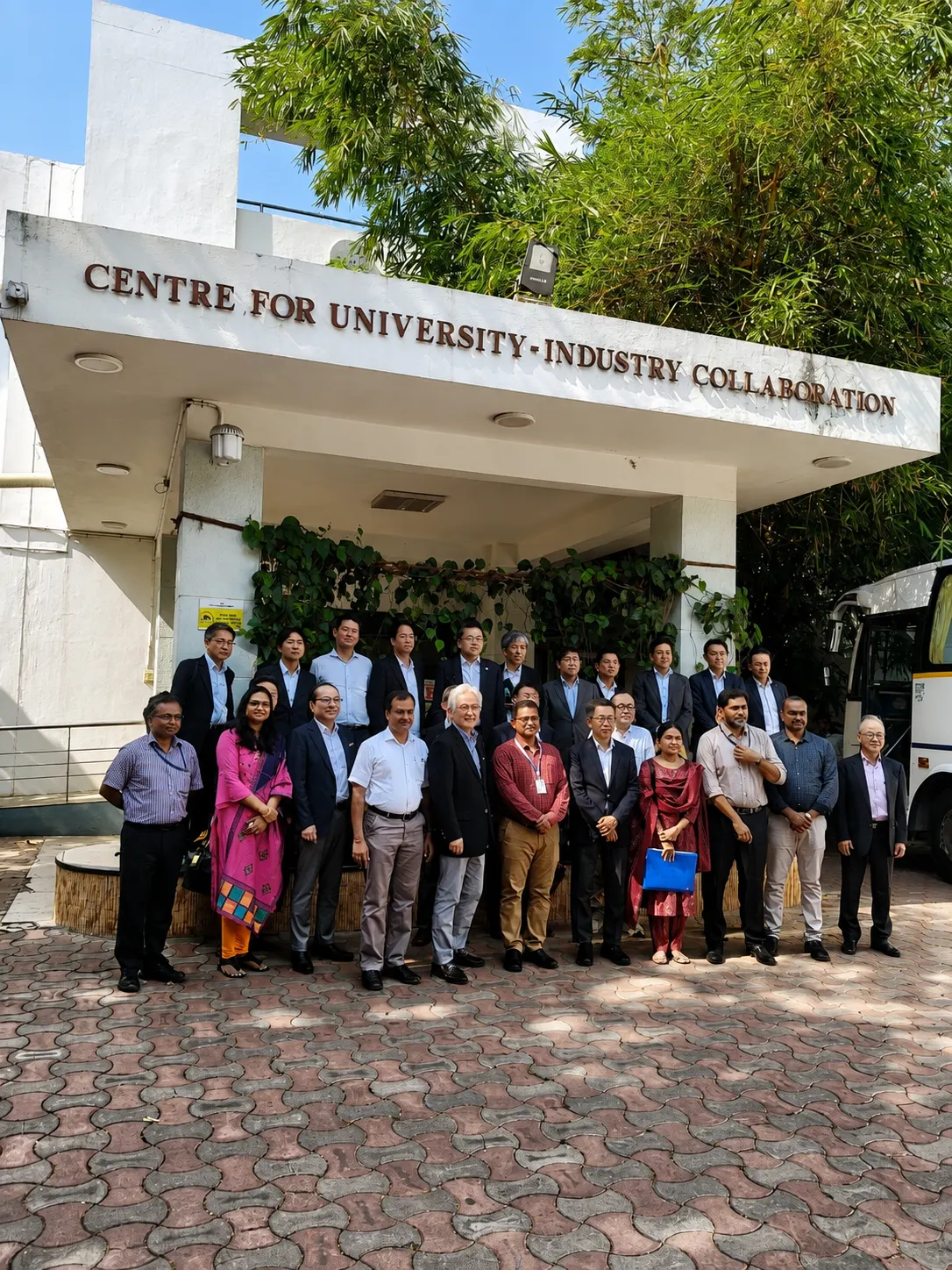A group photo outside the Centre for University-Industry Collaboration